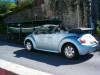 vw new beetle cabriolet devant bateau